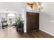 Welcoming foyer with hardwood floors, double doors, and plenty of natural light at 4440 W Fallen Leaf Ln, Glendale, AZ 85310