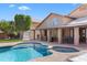 Inviting backyard pool and spa, ideal for relaxation and entertaining on sunny days at 4440 W Fallen Leaf Ln, Glendale, AZ 85310