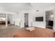 Bright bedroom with modern dresser, closet, and adjacent bathroom at 4705 W Annette Cir, Glendale, AZ 85308