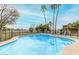 Refreshing fenced pool with palm tree views, perfect for backyard relaxation and fun at 4705 W Annette Cir, Glendale, AZ 85308