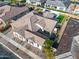 Expansive aerial view showcases the tile roof and backyard layout of this home, including hardscape at 5340 S Sabrina --, Mesa, AZ 85212