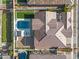 Top-down aerial view showcases the pool and patio area with meticulous landscaping of the property at 5340 S Sabrina --, Mesa, AZ 85212