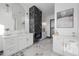 Modern bathroom with dual vanities, a fireplace, and designer fixtures at 5340 S Sabrina --, Mesa, AZ 85212