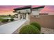 Modern clubhouse with stone accents and manicured landscaping at 5340 S Sabrina --, Mesa, AZ 85212