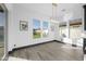 Bright dining area with natural light and backyard views, featuring modern light fixture at 5340 S Sabrina --, Mesa, AZ 85212