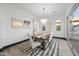 Cozy dining room with stylish chandelier and elegant seating at 5340 S Sabrina --, Mesa, AZ 85212