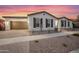 Beautiful single-story home featuring a landscaped yard and attached garage at 5340 S Sabrina --, Mesa, AZ 85212