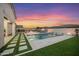 Backyard pool with in-pool fountains, a pergola-covered bar, and two fire features, all surrounded by lush landscaping at 5340 S Sabrina --, Mesa, AZ 85212