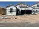 New construction of a single-Gathering home featuring Thermastud insulation, and an unfinished garage at 6078 E Artemis Dr, Florence, AZ 85132