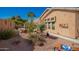 Private backyard with desert landscaping, hot tub, and covered patio at 6531 E Star Valley St, Mesa, AZ 85215