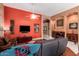 Living room space featuring hardwood floors and easy access to the fireplace at 6531 E Star Valley St, Mesa, AZ 85215