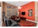 Spacious living room featuring stained glass windows, a ceiling fan, and a sofa at 6531 E Star Valley St, Mesa, AZ 85215