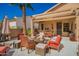 Inviting covered patio with comfortable outdoor seating and beautiful desert landscaping at 6531 E Star Valley St, Mesa, AZ 85215