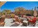 Relaxing patio with outdoor seating, landscaping, and a hot tub for entertaining at 6531 E Star Valley St, Mesa, AZ 85215