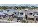 Aerial view of a two-story home with modern design, grey roof, and desert landscaping at 6735 N 9Th Dr, Phoenix, AZ 85013