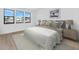 Comfortable bedroom featuring plush bedding, side tables, and a serene atmosphere at 6735 N 9Th Dr, Phoenix, AZ 85013