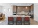 Modern kitchen featuring a large island, gray cabinets, and stainless-steel appliances at 6735 N 9Th Dr, Phoenix, AZ 85013