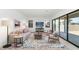 Stylish living room with neutral colors, comfortable seating, and large sliding glass door for natural light at 6735 N 9Th Dr, Phoenix, AZ 85013