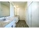 Bright bathroom showcasing double vanities, a glass-enclosed shower, and modern fixtures at 741 N Abalone Ct, Gilbert, AZ 85233