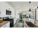 Modern kitchen featuring white cabinets, granite countertops, and stainless steel appliances at 741 N Abalone Ct, Gilbert, AZ 85233