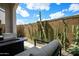 Inviting patio featuring a cozy seating area and desert landscaping for relaxing outdoor living at 741 N Abalone Ct, Gilbert, AZ 85233