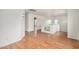 Bright hallway with hardwood flooring, neutral paint, and natural light at 7413 N 67Th Dr, Glendale, AZ 85303