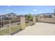 View from balcony of gravel backyard with fenced in yard and mountain views at 7421 S 25Th Ln, Phoenix, AZ 85041