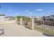 Outdoor balcony featuring a concrete surface and wrought iron railings at 7421 S 25Th Ln, Phoenix, AZ 85041