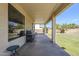 Covered patio with a built-in grill, perfect for outdoor cooking and entertainment at 7421 S 25Th Ln, Phoenix, AZ 85041