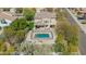 Overhead aerial view of large home, pool, outdoor lounge areas, and beautiful desert landscaping at 7693 E Via Del Sol Dr, Scottsdale, AZ 85255