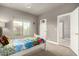 Cozy bedroom with playful decor, neutral carpet, and lots of natural light, perfect for a  at 7693 E Via Del Sol Dr, Scottsdale, AZ 85255