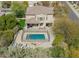 Backyard pool area featuring a secured fence, lounge chairs, and an outdoor seating area at 7693 E Via Del Sol Dr, Scottsdale, AZ 85255