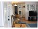 Cozy living room featuring a rocking chair and view into the kitchen at 7807 E Main St # B-19, Mesa, AZ 85207