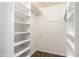 Organized walk-in closet with white shelving and ample space at 825 N Sierra Vista Dr, Wickenburg, AZ 85390