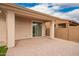 The covered back patio includes a sliding glass door for indoor-outdoor living at 8957 W Palo Verde Dr, Glendale, AZ 85305