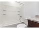 Bright white bathroom with shower and granite vanity at 8957 W Palo Verde Dr, Glendale, AZ 85305