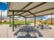 Covered picnic area with ample seating and scenic views of the surrounding community, great for outdoor dining and relaxation at 8957 W Palo Verde Dr, Glendale, AZ 85305