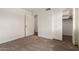 Bedroom with neutral carpet, featuring closet space at 945 N Pasadena St # 61, Mesa, AZ 85201