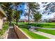 Exterior view of community walking path and green space at 945 N Pasadena St # 61, Mesa, AZ 85201