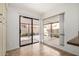 Bright kitchen nook featuring tile floors with a sliding glass door and view to the outside patio at 945 N Pasadena St # 61, Mesa, AZ 85201