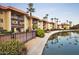 Beautiful condo community with lush landscaping, lake views, and a peaceful atmosphere at 10330 W Thunderbird Blvd # B101, Sun City, AZ 85351