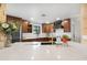 Well-lit kitchen featuring stainless steel appliances and wooden cabinets at 10406 E Silvertree Dr, Sun Lakes, AZ 85248