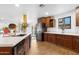 Modern kitchen featuring stainless steel appliances and wooden cabinets at 10406 E Silvertree Dr, Sun Lakes, AZ 85248