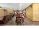 The dining room with tile floors offers easy access to the kitchen and living areas at 10718 W Saratoga Cir, Sun City, AZ 85351