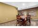 The dining area is bright with natural light and connects to the rest of the living space at 10718 W Saratoga Cir, Sun City, AZ 85351