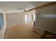 Living room featuring natural light and a ceiling fan at 10997 N Hualapai Dr, Casa Grande, AZ 85122