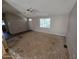 Spacious living room featuring neutral walls and flooring, with ample natural light at 10997 N Hualapai Dr, Casa Grande, AZ 85122