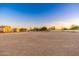 Vast backyard with plenty of space and storage sheds, offering many possibilities for outdoor activities at 11138 W Hatcher Rd, Sun City, AZ 85351