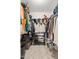 Walk-in closet has shelving and hanging space for optimal storage and organization at 11138 W Hatcher Rd, Sun City, AZ 85351