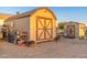 Backyard shed with ample storage and organization, ideal for all your outdoor needs and tools at 11138 W Hatcher Rd, Sun City, AZ 85351